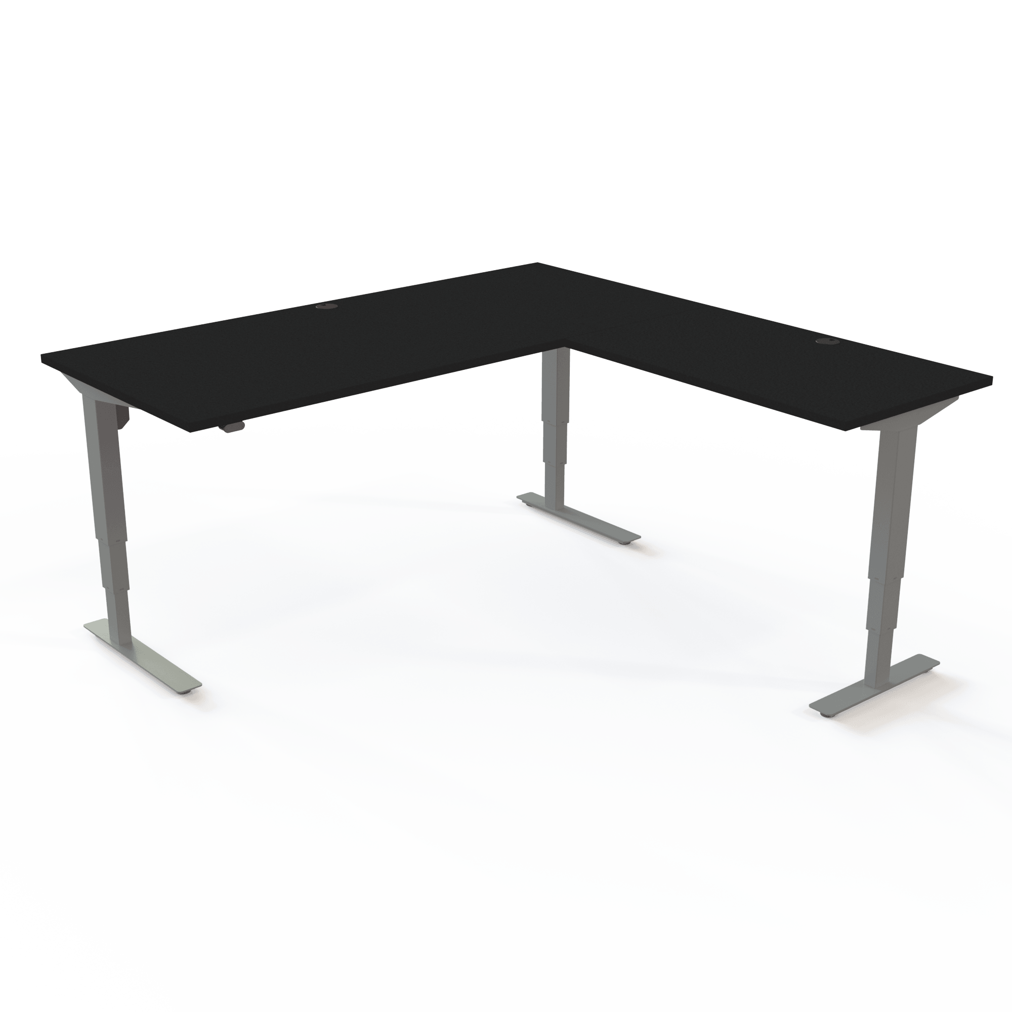 Electric height-adjustable desk with 3 columns, with a black tabletop and silver base. The size is 180x180. The height is 57-122cm and the table lifts 100kg.